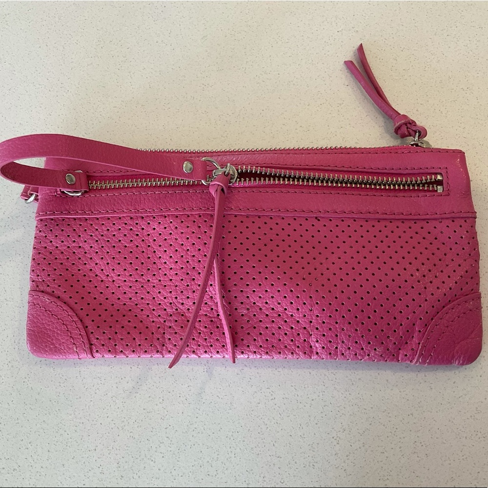 Pink leather clutch